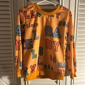 Letter printed long sleeves shirt used but in good condition true to size